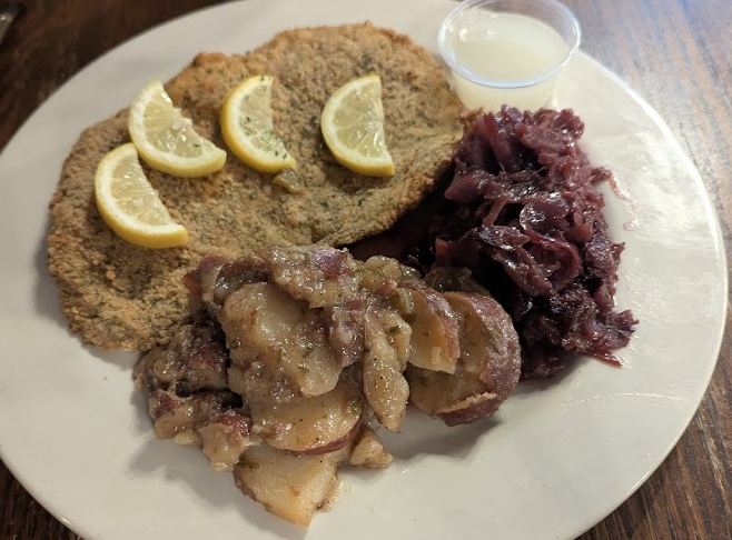 The Rathskeller signature dishes SchnitzelHot Wurst PlatterSauerbraten